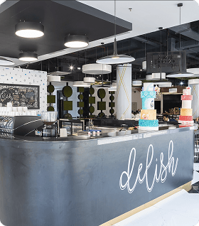 Student-led cafés and mobile food carts with rotating menus.